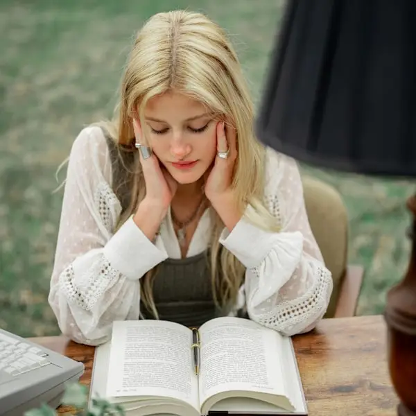 Lily Evans reading in the art studio